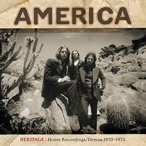 "CD cover with sepia-toned photo of three men in a desert landscape."