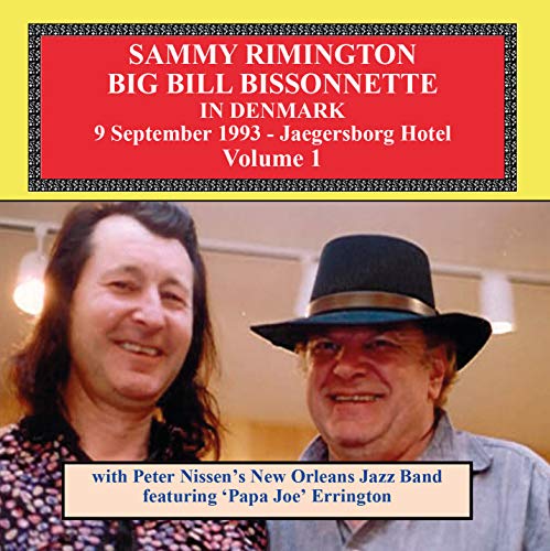 CD cover featuring two smiling musicians with text overlay describing the album.