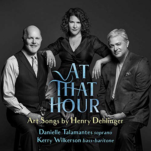 "CD cover featuring three musicians with title 'At That Hour' in blue text."