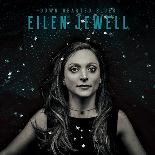 "Album cover featuring a black and white portrait of Eilen Jewell against a starry night sky."
