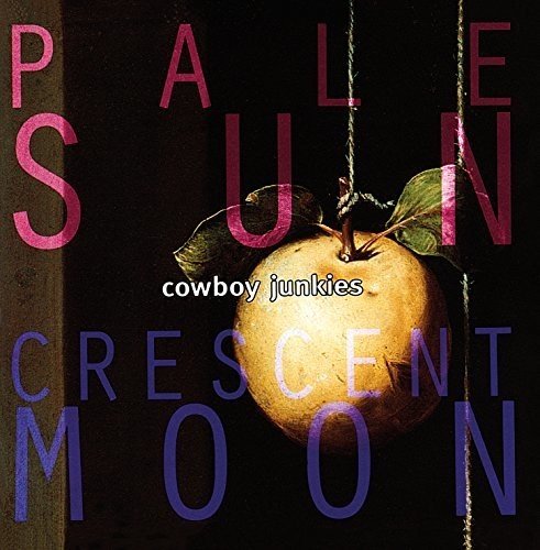 Album cover featuring a hanging pear with text "Pale Sun Crescent Moon" and "cowboy junkies".