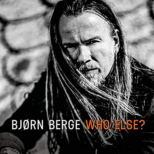 Black and white album cover featuring a man with long hair and beard.