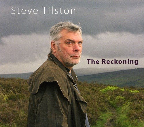 Album cover: man with grey hair in a field under a cloudy sky.