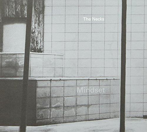 "Black and white album cover featuring a tiled wall with 'The Necks Mindset' text."