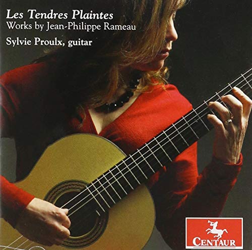 A woman in red plays a guitar on a music CD cover.