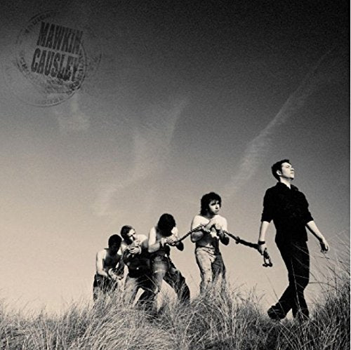 "Album cover featuring a black and white image of a man and three women."