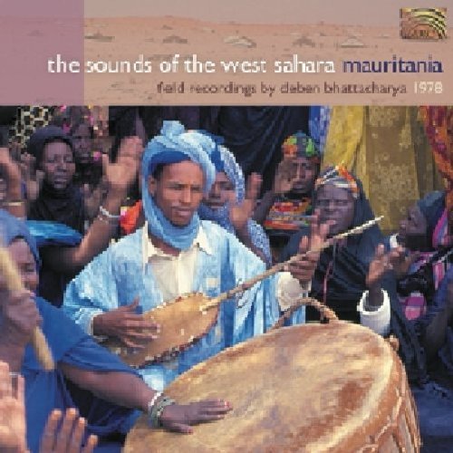 "CD cover with a man playing a drum surrounded by a group of people."