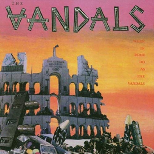 "Album cover art: The Vandals, featuring a ruined Colosseum at sunset with wrecked cars below."