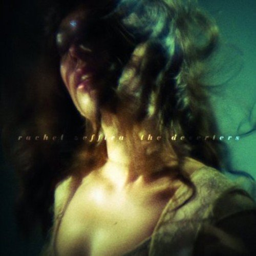 The alt text for the image is: "Album cover for 'The Deserters' by Rachel Zeffira, featuring a woman."