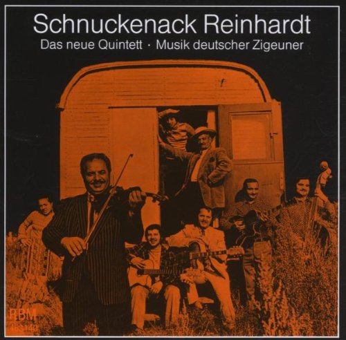 "CD cover with sepia-toned image of musicians around a caravan, playing instruments."