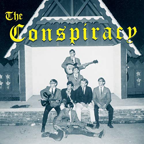 Black vinyl 7-inch record with a sleeve, titled "The Conspiracy" with two song titles.