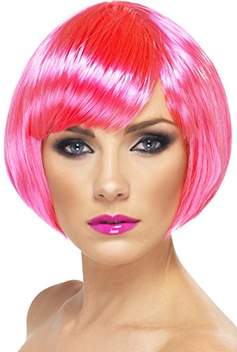A mannequin head wearing a bright pink, short, bobbed wig and pink lipstick.