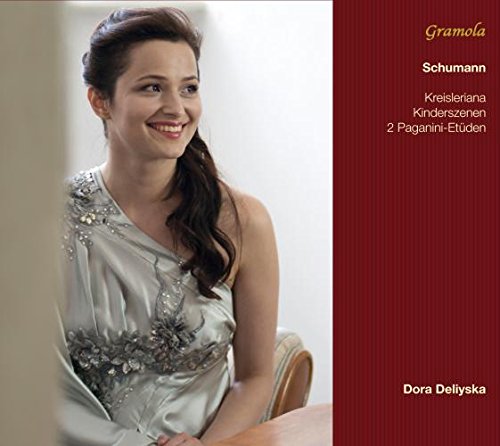 Woman in silver dress on CD cover with red background and white text.