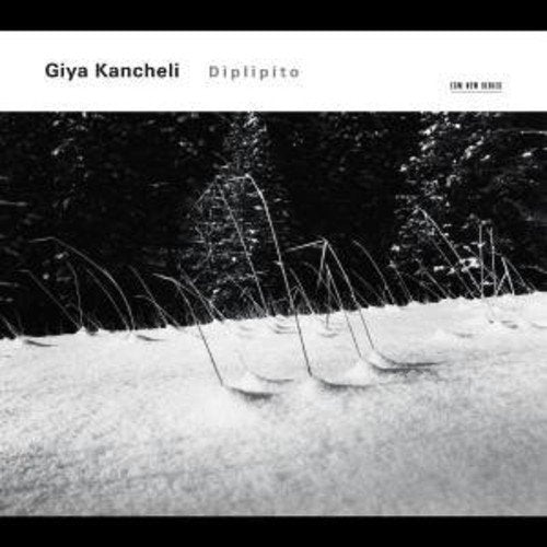 A black and white CD cover featuring a snowy landscape with bent grass stalks.