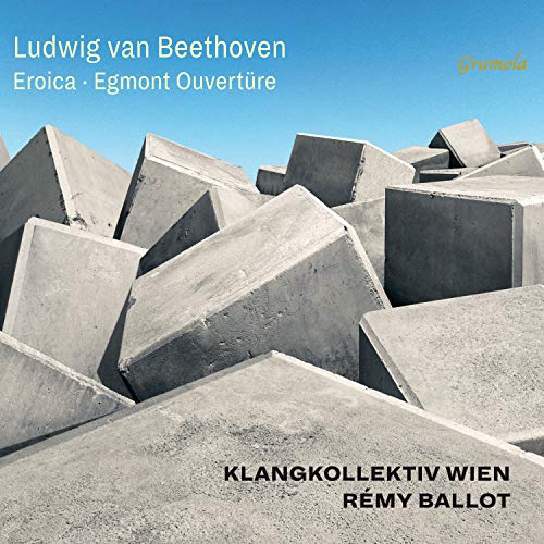 A CD cover featuring abstract gray concrete shapes against a blue sky background.