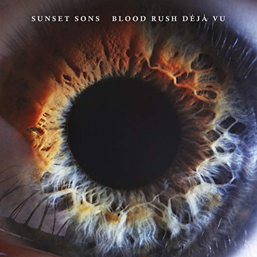 "Album cover featuring a close-up of a human eye with orange and white iris."
