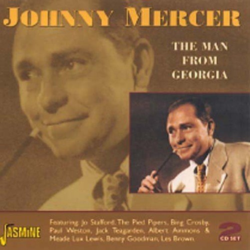 "CD cover with Johnny Mercer's photo, yellow and brown background, and featured artists listed."