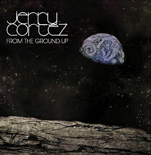 "Album cover with brain floating in space, artist name and title."