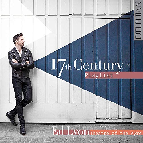 Man in black leather stands against white and blue garage door, album cover art.