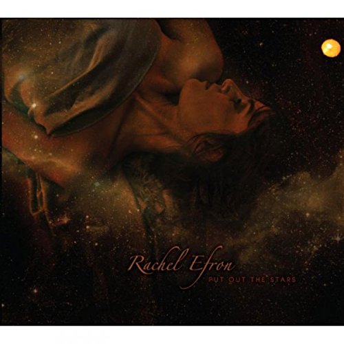 "Album cover with a woman's face against a starry night sky."