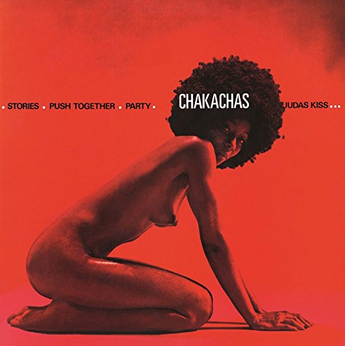"Vinyl record sleeve with red cover, featuring a kneeling figure and song titles."