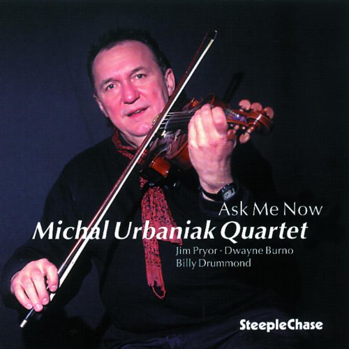 The image depicts a man holding a violin and bow, with the title "Ask Me Now" and "Michal Urbaniak Quartet" written across it. Alt text: Man holding violin, with text overlay on dark background.
