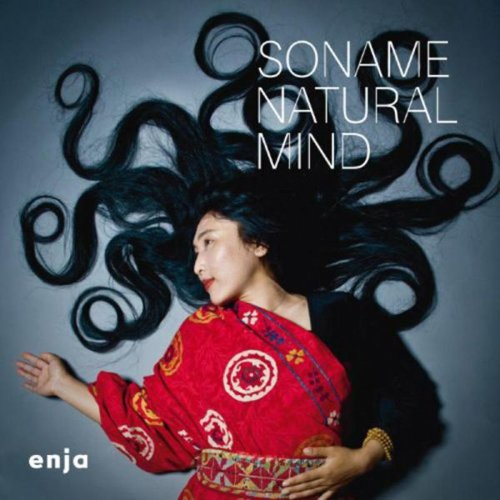 Woman in red robe with flowing black hair against a grey background, album cover.