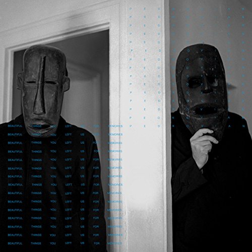 "Vinyl album cover featuring two men wearing masks in a doorway."