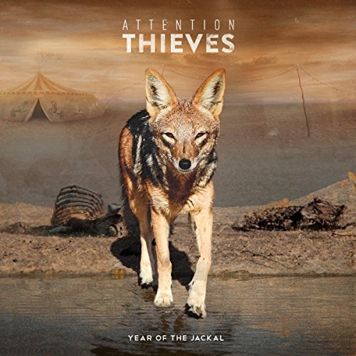 Album cover with a jackal walking towards the camera, desert landscape in the background.