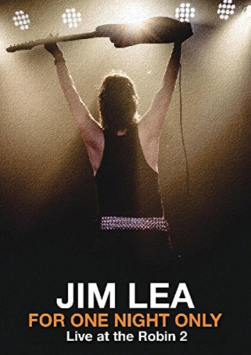 DVD cover featuring a musician holding a bass guitar on stage under spotlights.