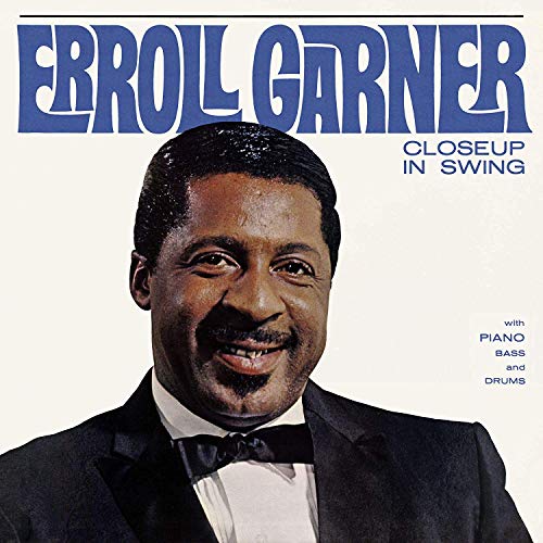 Album cover featuring Erroll Garner in a tuxedo, smiling, with blue text on a white background.