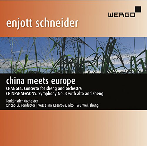 The alt text for the image is: "CD cover with grass and blue sky, text describing the album."