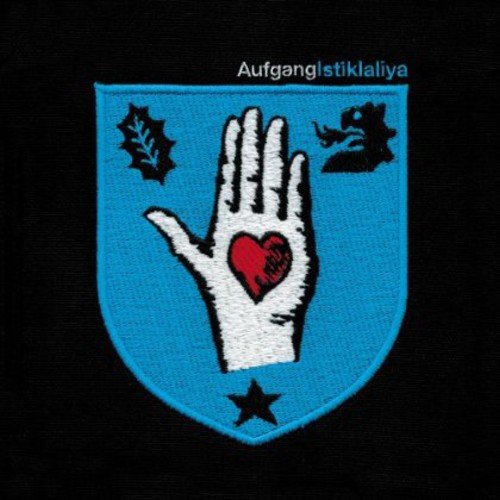 A blue shield with a white hand and red heart on a black background.