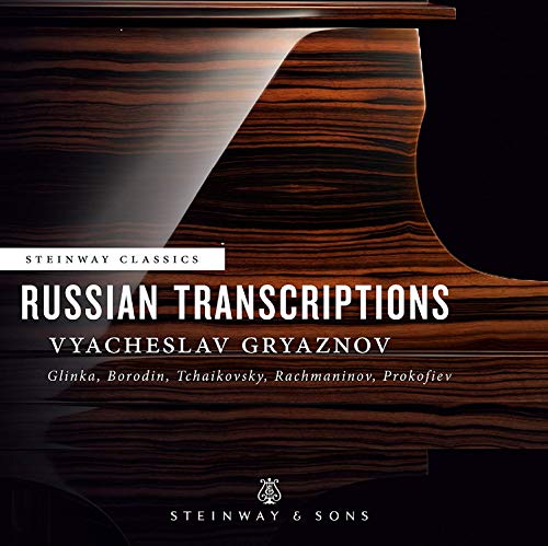 "CD cover featuring a dark wood piano with white text."