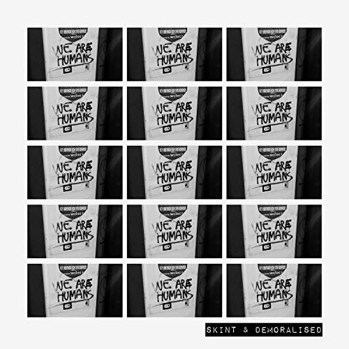 A vinyl record album cover featuring a white t-shirt with "We Are Humans" written.
