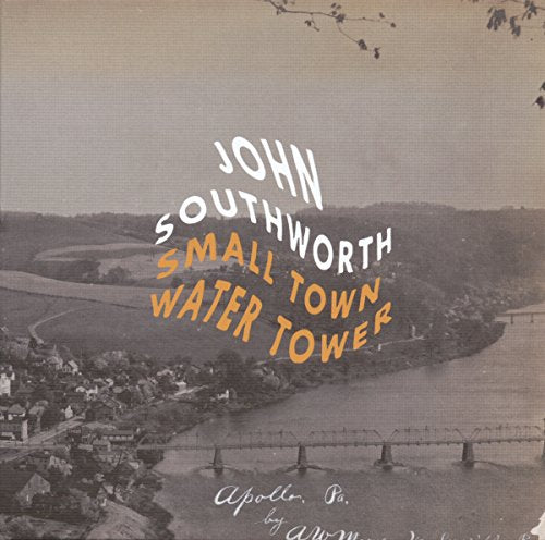 Album cover with sepia-toned landscape image and stylized artist and title text overlay.