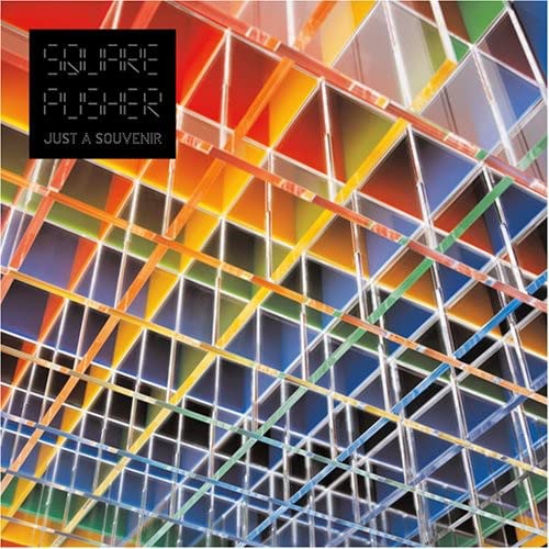 Squarepusher “Just A Souvenir” CD cover with abstract geometric design.