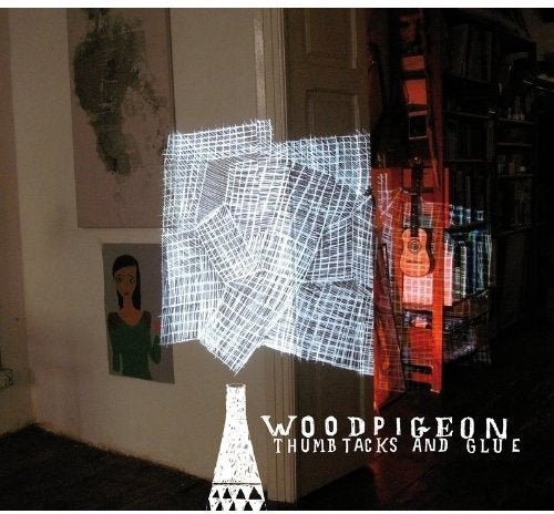"Album cover featuring a lamp with a grid-patterned shade and 'Woodpigeon' text."