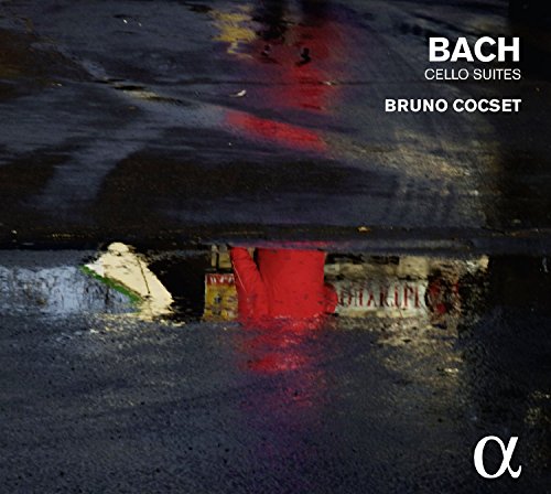 The alt text for the image is: "CD cover with dark, abstract background and white text."