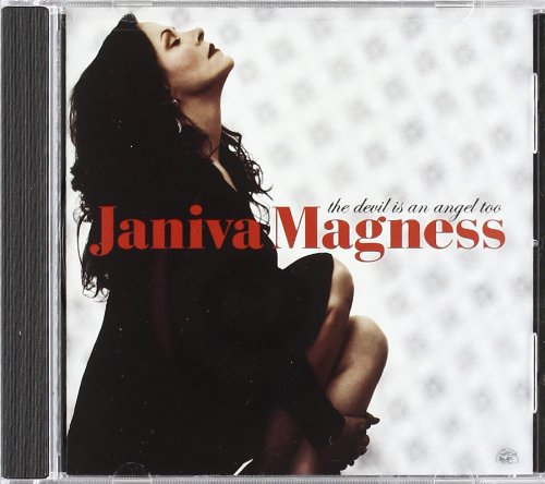 "Album cover with a woman in black dress, red and black text overlay."