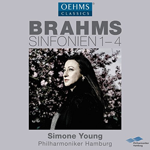 CD cover with black and white photo of a woman against a light grey background.