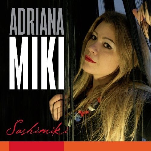 "CD cover featuring a woman peeking through curtains with text 'Adriana Miki Sashimiki'."