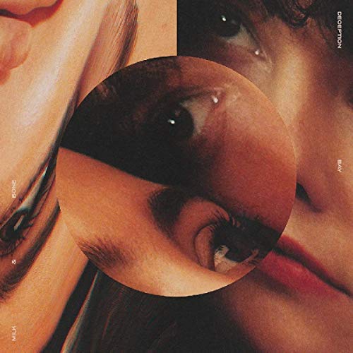 Vinyl album cover with a close-up of a person's face and eye.