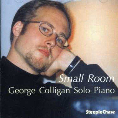 "CD cover with blurry man in suit and 'George Colligan Solo Piano' text."