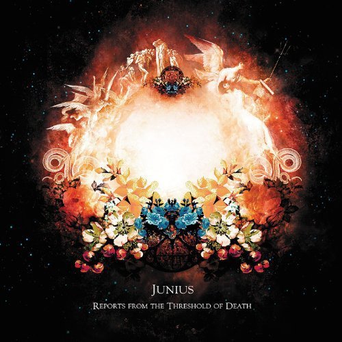 Album cover with a glowing white orb surrounded by flowers against a black background.