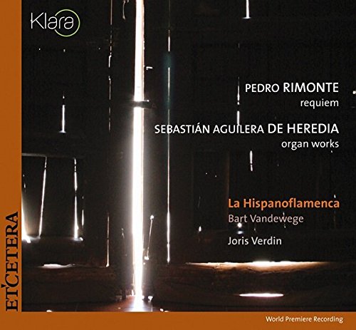 "CD cover with organ pipes, dark background, and white and orange text."