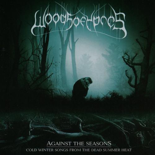 "CD album cover with dark forest scene and stylized band name at the top."