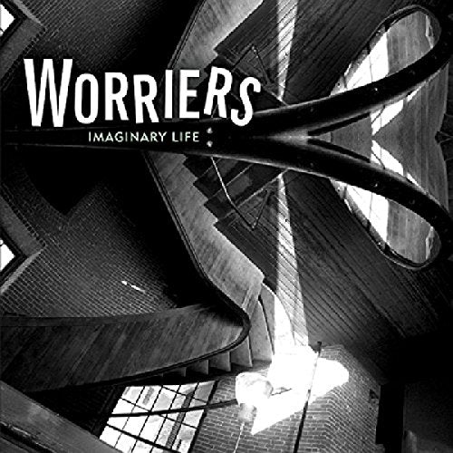 Black and white album cover with a spiral staircase and the title "Imaginary Life".