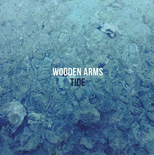 The image depicts a blue-toned vinyl record cover. Alt text: Blue vinyl record cover with "Wooden Arms - Tide" text overlay.