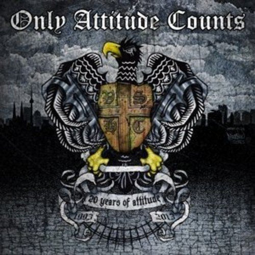 "CD cover with eagle emblem, shield, and '20 years of attitude' banner."